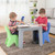 Toddler boys coloring using simplay3 play around table and chair set
