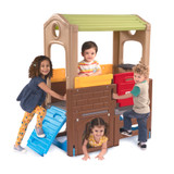 Kids playing on Young Explorers Indoor/Outdoor Discovery Playhouse with climbing wall and working doors and cup holders