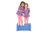 Two children standing on either side of a Periwinkle Simplay3 Sibling Step Stool